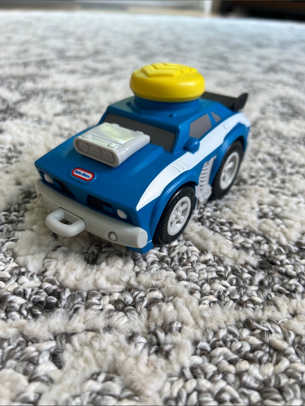 Little Tikes Blue and Yellow push button to go Race Car Toy